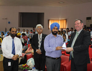 Hon'ble Vice Chairman is honouring Prof. Michael Clements (Chief Academic Officer, ATMC).